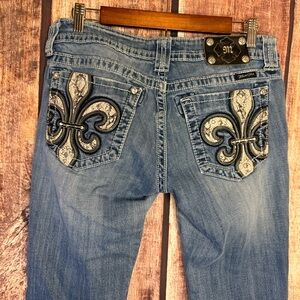 Stylish Blue Jeans with Embroidered Pockets